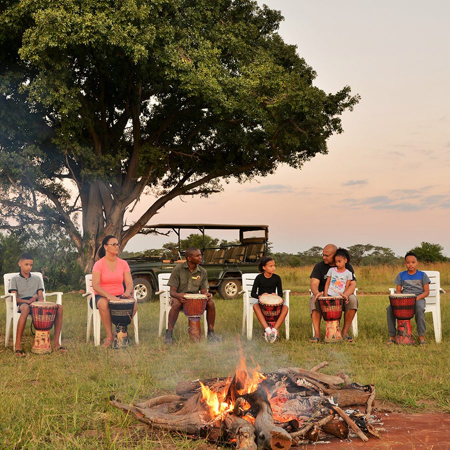 Mabula Game Lodge. People sat around a fire